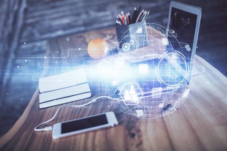 Computer on desktop with social network theme icon. Multi exposure. Concept of international connections.の写真素材