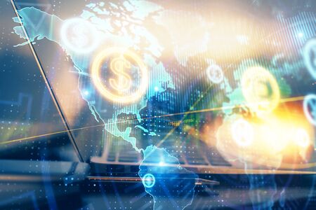Forex graph hologram on table with computer background. Multi exposure. Concept of financial...