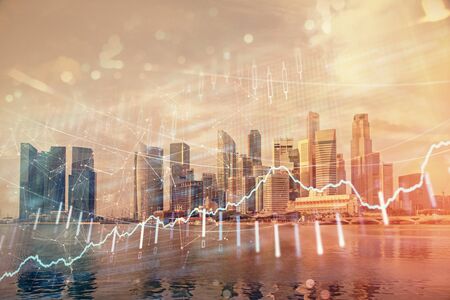 Forex chart on cityscape with tall buildings background multi exposure. Financial research concept.