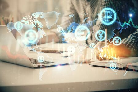 Multi exposure of forex chart with man working on computer on background. Concept of market analysis.の写真素材