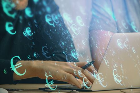 Forex graph with businessman typing on computer in office on background. Concept of analysis. Double...