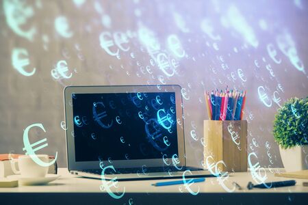 Financial market graph hologram and personal computer on background. Double exposure. Concept of forex.の写真素材