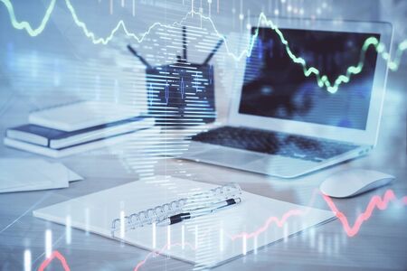 Forex Chart hologram on table with computer background. Double exposure. Concept of financial...