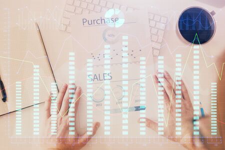 FOREX chart multi exposure with work table background.の写真素材