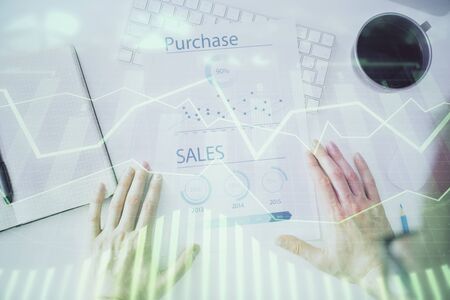 FOREX chart multi exposure with work table background.の写真素材