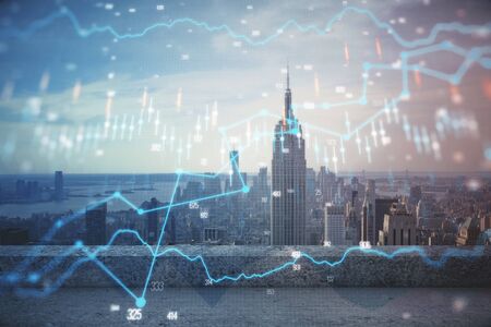 Forex graph on city view with skyscrapers background multi exposure. Financial analysis concept.の写真素材