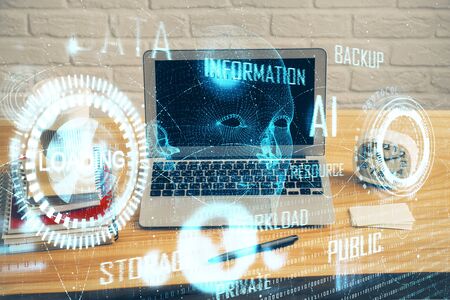Technology theme drawing and table with computer. Double exposure. Concept of information.の写真素材
