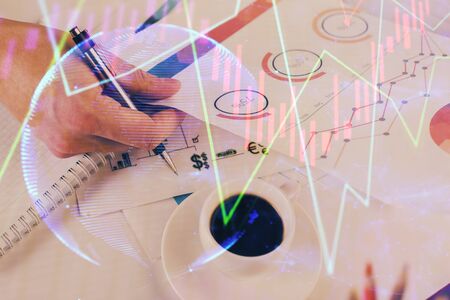 Multi exposure of man planing investment with stock market forex chart.の写真素材