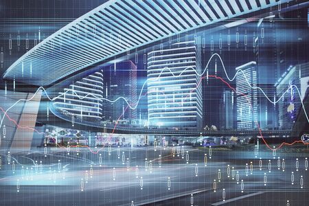 Forex chart on cityscape with tall buildings background multi exposure. Financial research concept.の写真素材