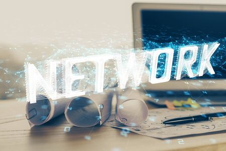 Technology theme drawing and table with computer. Double exposure. Concept of information.の写真素材