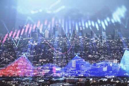 Forex chart on cityscape with skyscrapers wallpaper double exposure. Financial research concept.の写真素材