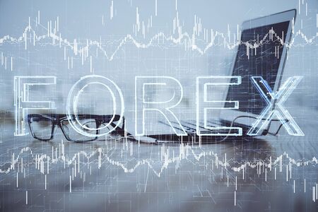 Multi exposure of chart and financial info and work space with computer background. Concept of international online trading.の写真素材