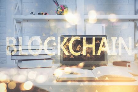 Multi exposure of blockchain theme hologram and table with computer background. Concept of bitcoin crypto currency.の写真素材