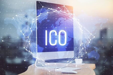 Multi exposure of blockchain theme hologram and table with computer background. Concept of bitcoin...