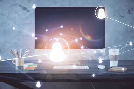 Computer on desktop with social network theme icon. Multi exposure. Concept of international connections.の写真素材