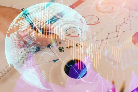 Multi exposure of man planing investment with stock market forex chart.の写真素材