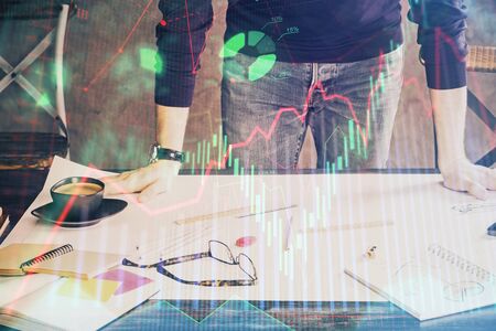 Multi exposure of man standing and planing investment with stock market forex chart background. Concept of research and trading.の写真素材