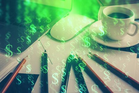 Financial chart drawing and table with computer on background. Double exposure. Concept of international markets.の写真素材