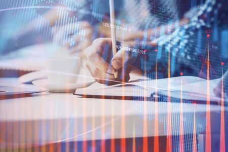 Multi exposure of two men planing investment with stock market forex chart.の写真素材