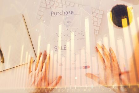 FOREX chart multi exposure with work table background.の写真素材