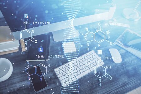Desktop computer background and DNA drawing. Double exposure. Science concept.