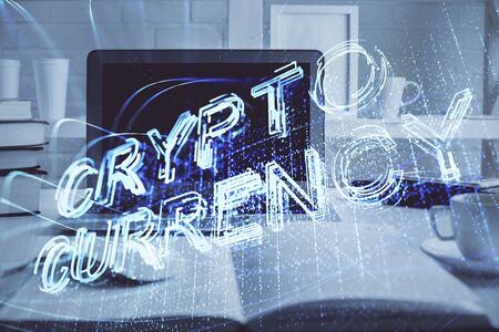 Multi exposure of blockchain theme hologram and table with computer background. Concept of bitcoin crypto currency.の写真素材
