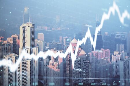 Forex graph on city view with skyscrapers background multi exposure. Financial analysis concept.