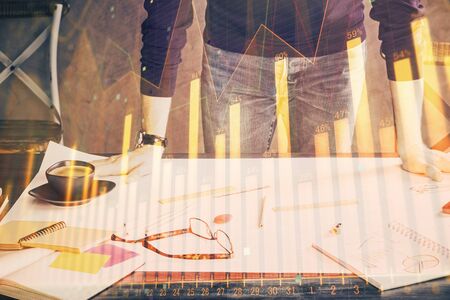 Multi exposure of man standing and planing investment with stock market forex chart.の写真素材
