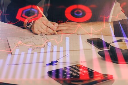 Double exposure of man doing analysis of stock market with forex graph.