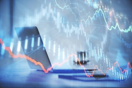 Multi exposure of forex graph and work space with computer. Concept of international online trading.