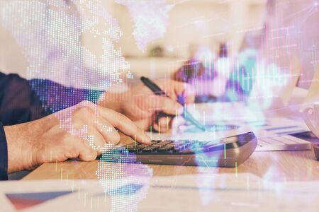 Financial trading graph multi exposure with man desktop background.の写真素材