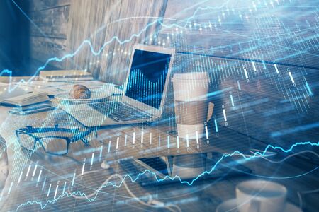 Double exposure of forex chart and work space with computer. Concept of international online...