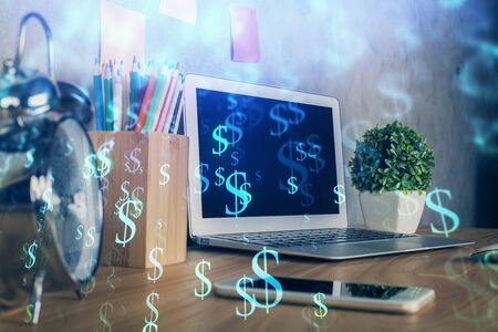 Financial market graph hologram and personal computer on background. Double exposure. Concept of forex.の写真素材