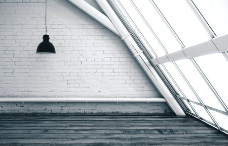 Clean empty brick attic interior with panoramic view and daylight. 3D Renderingの写真素材