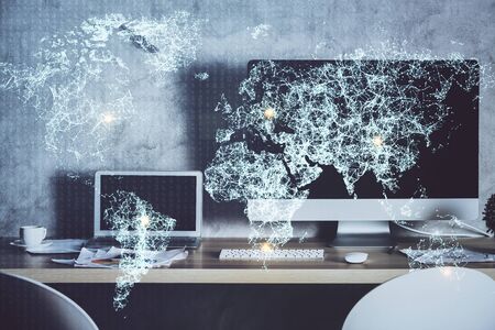 Computer on desktop with social network theme icon. Multi exposure. Concept of international connections.の写真素材