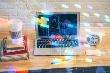 Technology theme drawing and table with computer. Double exposure. Concept of information.の写真素材