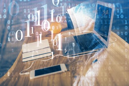 Technology theme drawing and table with computer. Double exposure. Concept of information.の写真素材