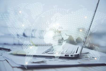 Multi exposure of business theme icons and work space with computer background. Concept of success.