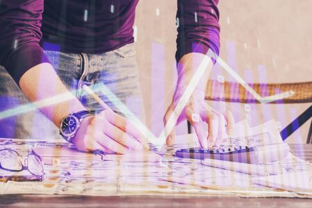 Multi exposure of man standing and planing investment with stock market forex chart.の写真素材