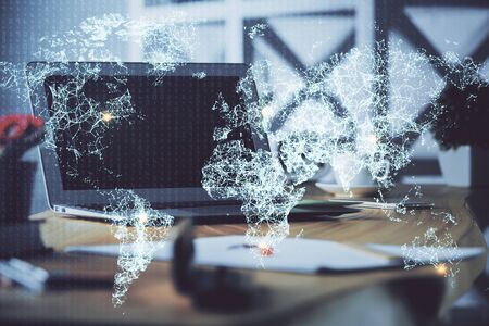 Computer on desktop with social network theme icon. Multi exposure. Concept of international connections.の写真素材