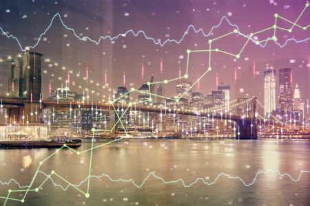 Financial chart on city scape with tall buildings background multi exposure. Analysis concept.の写真素材