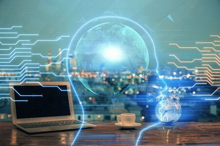 Double exposure of work table with computer and brain sketch hologram. Brainstorming concept.