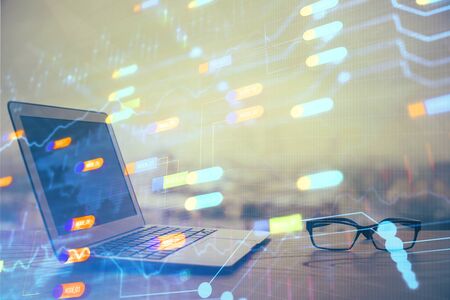 Double exposure of computer and technology theme hologram. Concept of freelance work.の写真素材