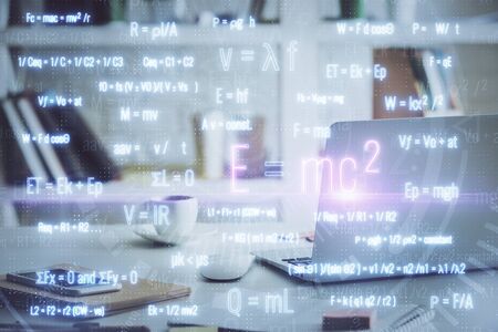 Desktop computer background and formula hologram writing. Double exposure. Education concept.