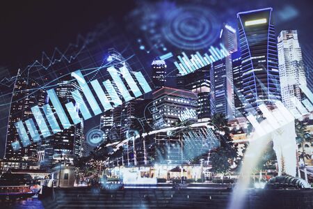 Financial chart on city scape with tall buildings background multi exposure. Analysis concept.の写真素材