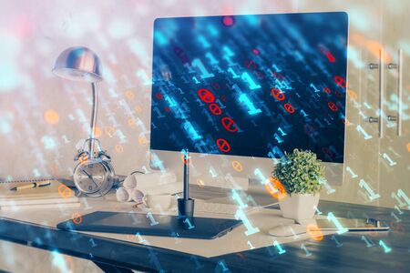 Double exposure of computer and technology theme hologram. Concept of freelance work.の写真素材