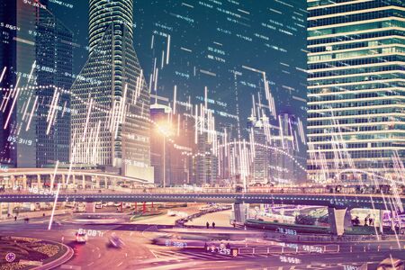 Financial chart on city scape with tall buildings background multi exposure. Analysis concept.の写真素材
