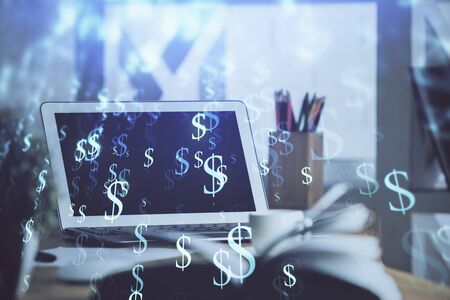 Stock market graph on background with desk and personal computer. Double exposure. Concept of financial analysis.の写真素材