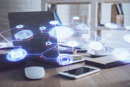 Computer on desktop with social network theme icon. Multi exposure. Concept of international connections.の写真素材