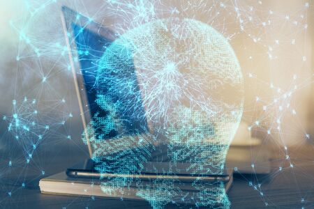 Multi exposure of work table with computer and brain hologram. Brainstorm concept.